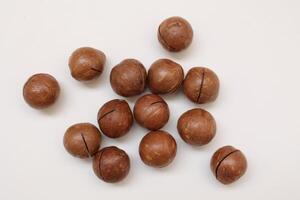 Macadamia nuts seeds background photo