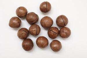 Macadamia nuts seeds background photo