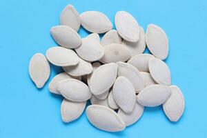 Top view of pumpkin seeds pattern texture background photo