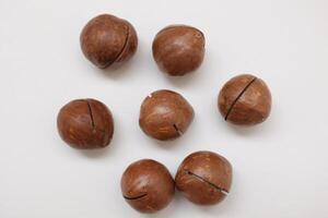 Macadamia nuts seeds background photo