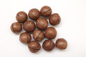 Macadamia nuts seeds background photo