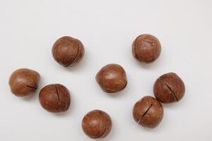 Macadamia nuts seeds background photo