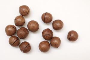 Macadamia nuts seeds background photo