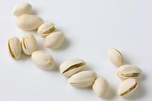 Pistachio nut isolated on white background photo