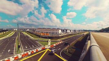 Malaysia - 5th april, 2024 - timelapse panorama row of white residential buildings complex on sunny day time lapse with cloudscape movement.Copy space property in asia background video