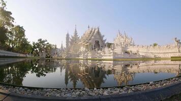 Chiang Rai, Thailand - March 15th ,2024 - zoom in Wat Rong Khun or White Temple - famous Buddhist temple in Pa O Don Chai, Mueang District, Chiang Rai Province, Thailand video