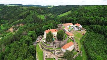 Aerial backwards view of castle Svojanov in Czechia in June 2024 video