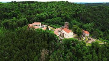 Aerial orbiting ascending view of castle Svojanov in Czechia in June 2024 video