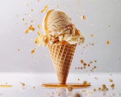 an ice cream cone with caramel and syrup is being splashed photo