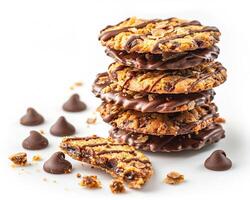 a stack of chocolate covered cookies with a few pieces missing photo