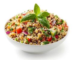 a bowl of quinoa salad with vegetables and herbs photo