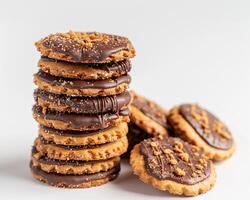 chocolate peanut butter cookies stacked on top of each other photo