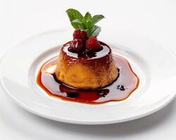 a dessert on a plate with a raspberry sauce photo