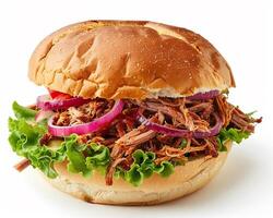 a pulled pork sandwich with lettuce and onions photo