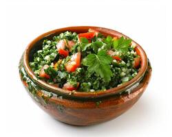 a bowl of salad with tomatoes and parsley photo