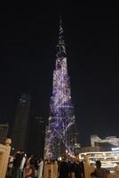 Burj Khalifa at night with different colors photo