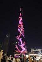 Burj Khalifa at night with different colors photo