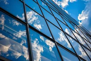 A building with a lot of windows and a cloudy sky photo