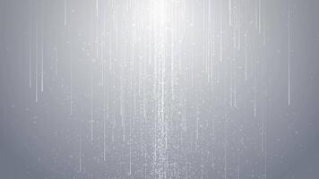 Abstract rain of glitter particles on a clean white-gray background. Shining particles and beautiful bokeh. Seamless looping animation video