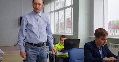 Teacher And Pupils In Programming And Coding Courses For Children In Classroom, Future Programmers video
