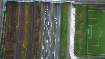 Aerial view of the highway with cars near the railway and technical waste video