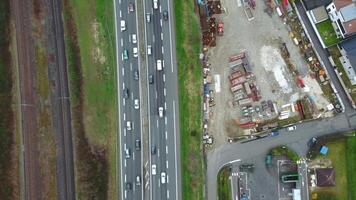 Aerial view of the highway with cars near the railway and technical waste video
