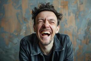 Joyful man laughing heartily against textured background photo