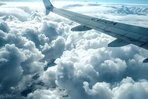 Majestic view from airplane window above clouds photo