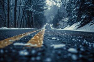 Closeup view of a snowy road with blurred trees and falling snowflakes photo