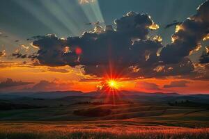 Sun setting over rolling hills casting golden light beams through clouds photo