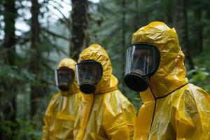 Group of scientists wearing hazmat suits and gas masks standing in forest photo