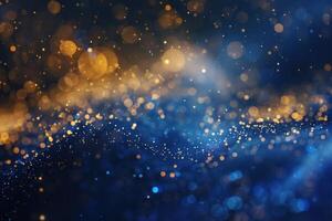 Abstract gold and blue defocused lights creating festive bokeh background photo