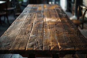 Empty rustic wooden table taking center stage in a blurred restaurant photo