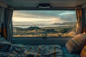 Waking up in a camper van facing a beautiful ocean view at sunset photo