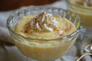 Homemade vanilla pudding with whipped cream photo
