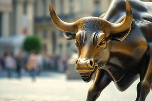 Charging bull statue close-up in urban setting photo