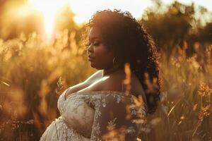 Serene sunset portrait of a woman in a field photo