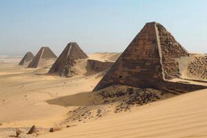 Ancient nubian pyramids in the desert sands photo
