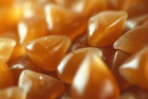 Glowing amber honey drops background photo