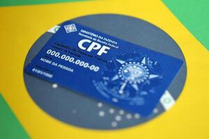 KYIV, UKRAINE - OCTOBER 31, 2023 Blue CPF card document template. The document guarantees authenticity and integrity in electronic communication between people in Brazil photo