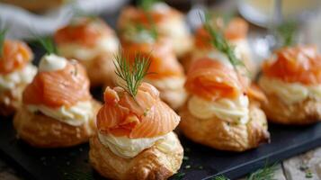Snack profiteroles with salmon photo