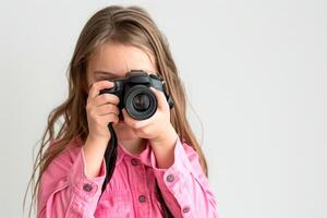 a girl photographer holding DSLR camera take photo , word international photo day concept