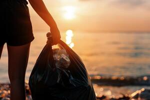 A person collects plastic wastes including bottle with empty space for text a concept of save the environment, . photo
