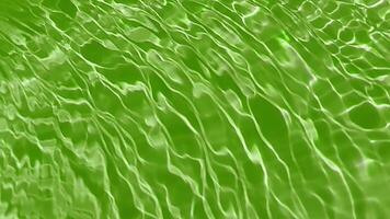 Green water with ripples on the surface. Defocus blurred transparent blue colored clear calm water surface texture with splashes and bubbles. Water waves with shining pattern texture background. video