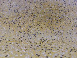 Smooth surface, yellow stone pattern. photo