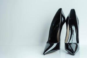 Timeless Elegance Black Heels on White Background photo