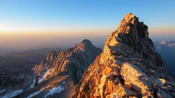 Majestic Peak Reaching Towards Sunlit Sky photo