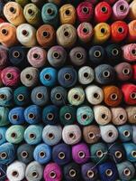 Textile Mosaic A Colorful Array of Thread on Plateau photo