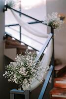 Bogor, June 21 2024. Upward staircase adorned with vibrant bird paintings and floral decorations, creating a whimsical ascent. photo