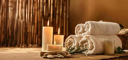 The composition of spa and wellness concept with brown towels, candles and sea salt on dark background with copy space for text. beautiful spa setting, spa elements, professional photo, studio light photo